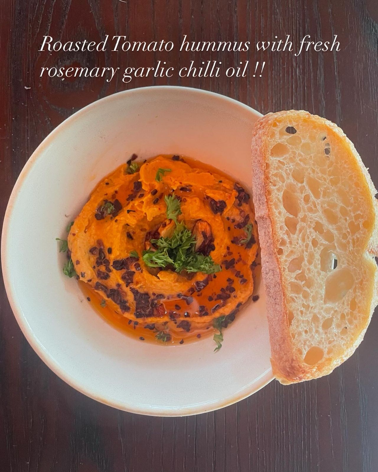 Roasted Tomato Hummus with Fresh  Rosemary Garlic Chilli Oil